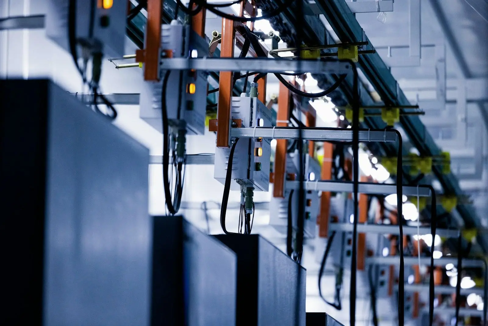 Sheet-metal cable managers and overhead power distribution in a data center (stock photos)
